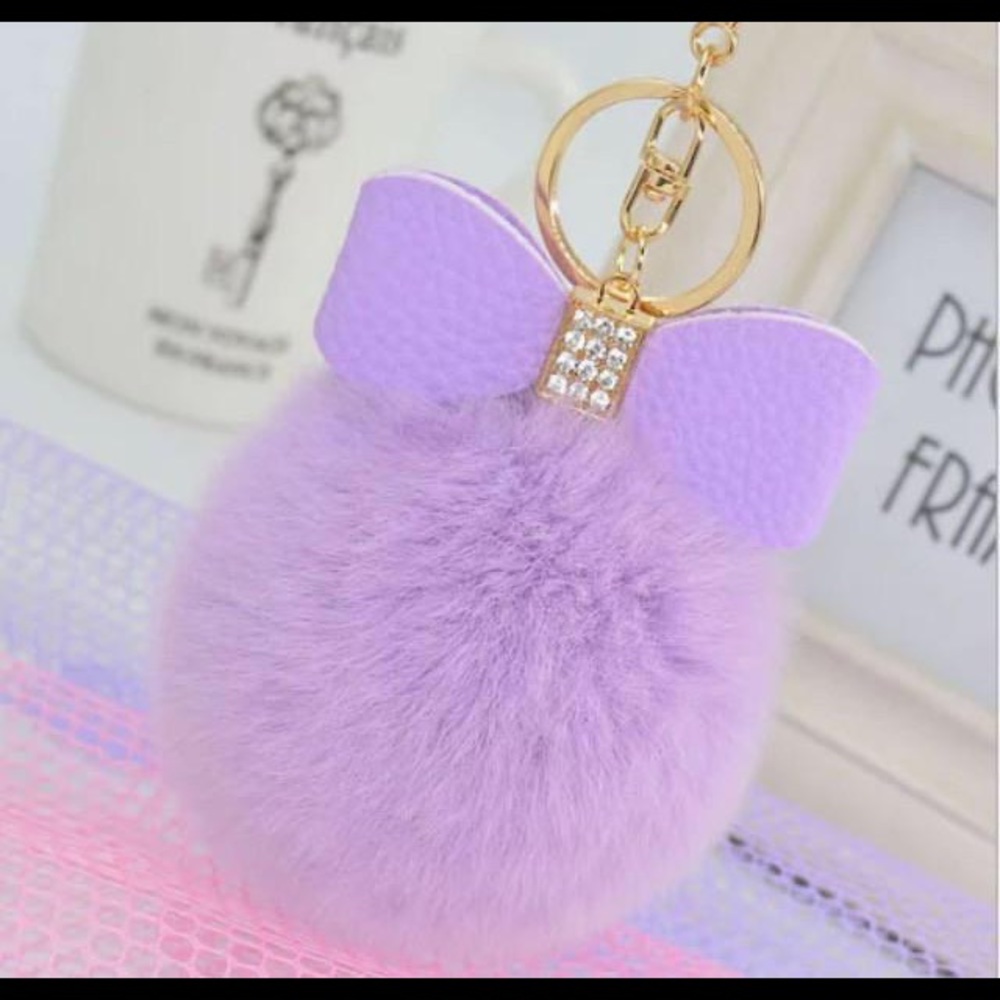 lilac pom pom bag charm keychain